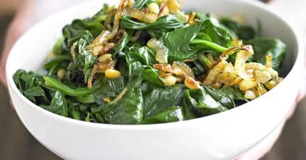 Spinach with onions & pine nuts