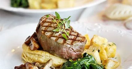Steak with mushroom puff tartlets