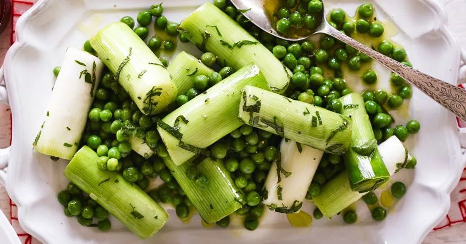 Steamed leeks & peas with herby vinaigrette