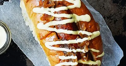 Sticky cider onion hot dogs
