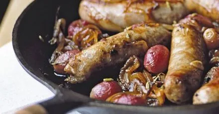 Sticky pan-roasted sausages with grapes