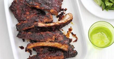 Sticky ribs with roast potato salad