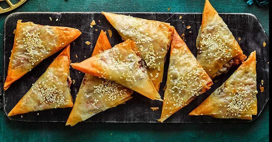 Sticky shallot, fig & almond filo parcels