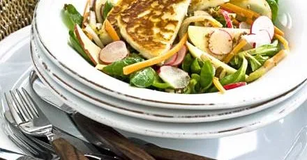 Warm halloumi with radish, apple & pecan salad