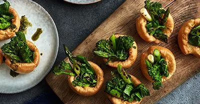 Yorkshire puddings filled with charred greens & mint sauce