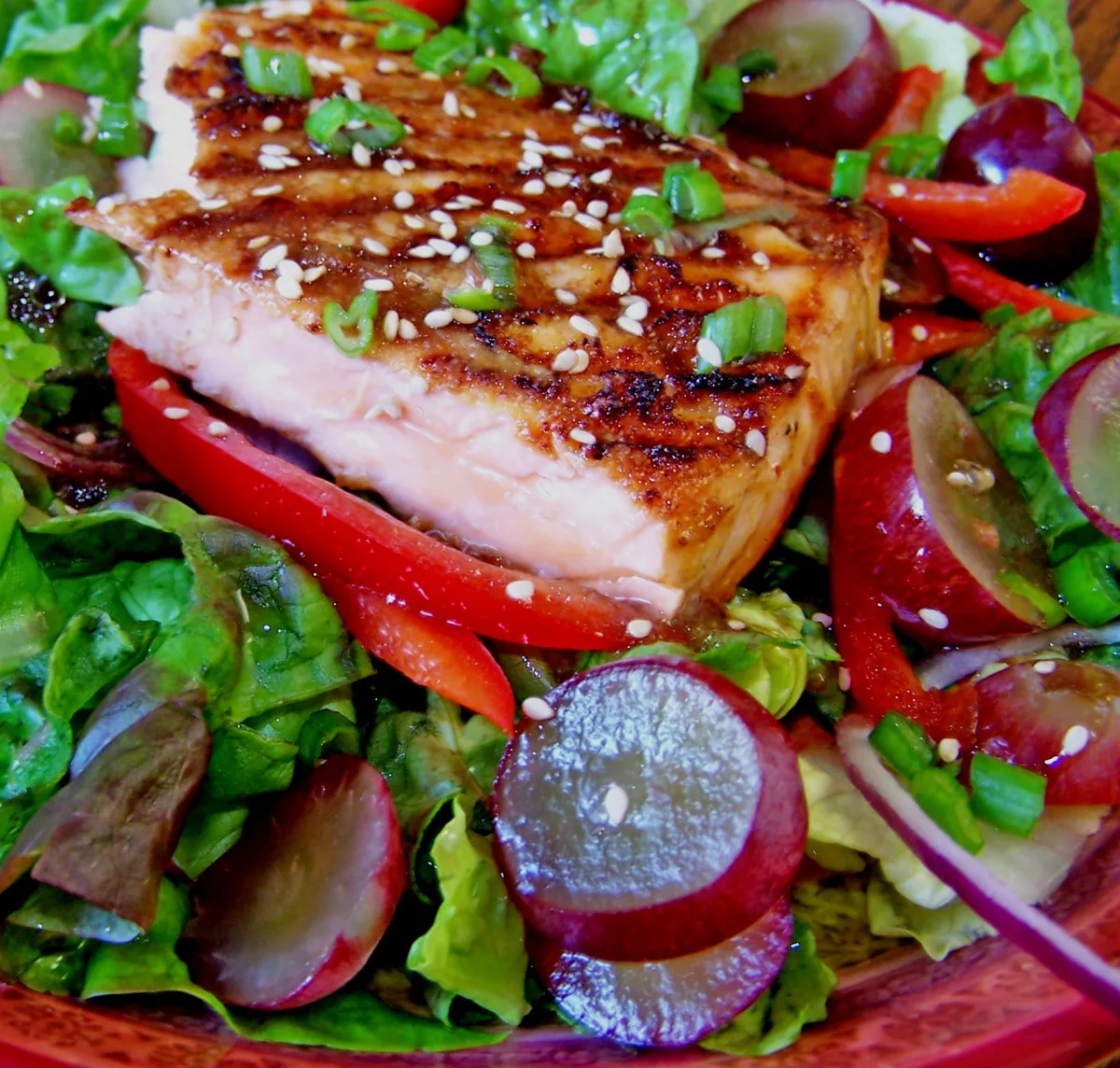 Seared Salmon With Grapes on a Bed of Greens