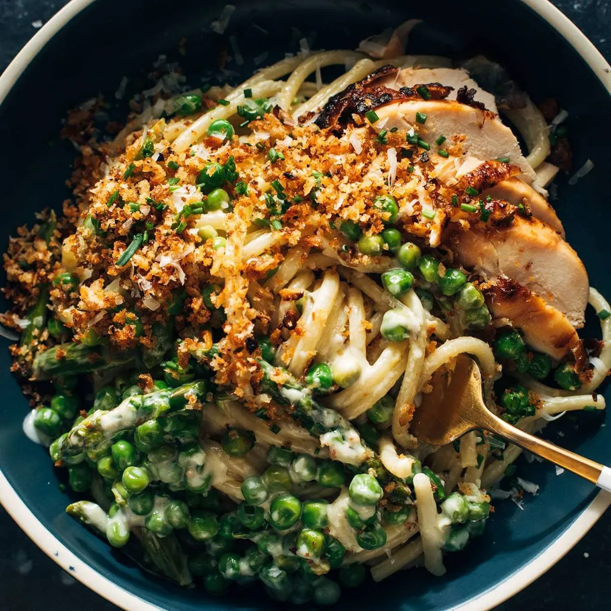 Garlic Cream Bucatini with Peas and Asparagus