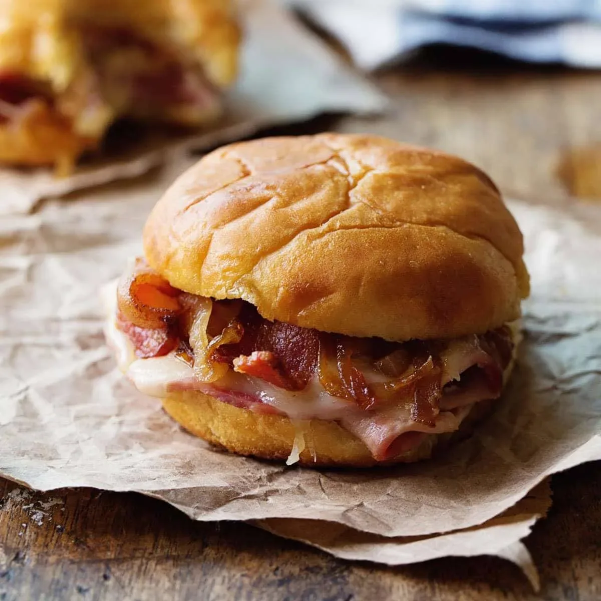 Hot Ham and Cheese Sandwiches with Bacon and Caramelized Onions