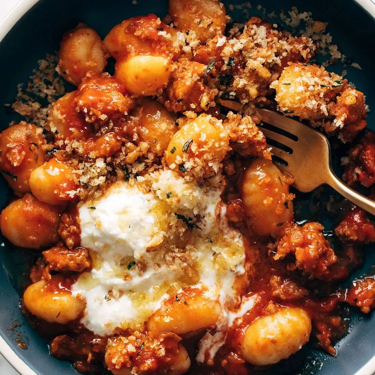 Millionaire Gnocchi with Red Sauce, Herbed Ricotta, and Golden Crispies